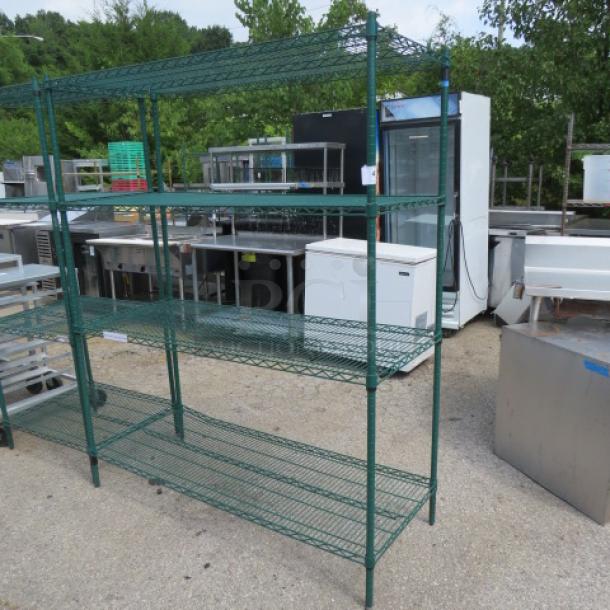 Green coated Metro shelf with four shelves, dimensions 60x24x74 inches, features durable wire construction, excellent condition.