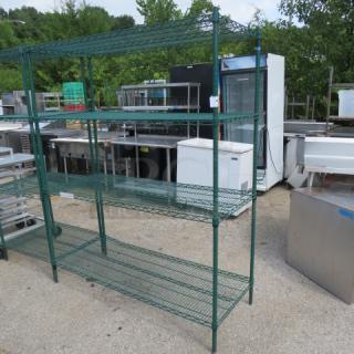 Green coated Metro shelf with four shelves, dimensions 60x24x74 inches, features durable wire construction, excellent condition.