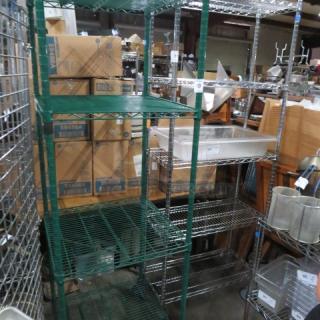 Green coated Metro shelf with 4 adjustable shelves, 24x24x75 inches. Good condition, sturdy wire construction.