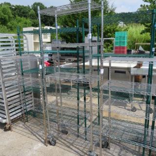 Metro shelf with five wire shelves on casters, 30x14x80 inches. Durable, mobile, ideal for storage.