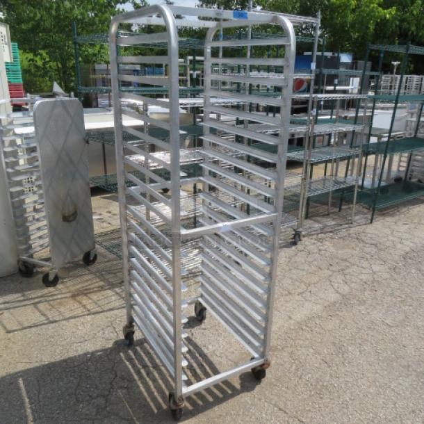 Advance Tabco speed rack on casters, Model PR20-3W, measures 20.5x26.5x69 inches. Holds multiple trays. Used condition.