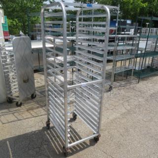 Advance Tabco speed rack on casters, Model PR20-3W, measures 20.5x26.5x69 inches. Holds multiple trays. Used condition.