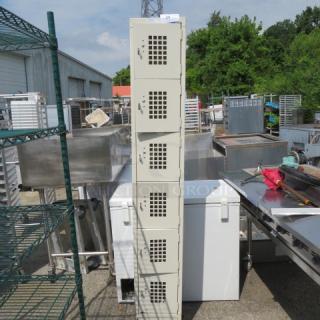 Winholt Locker System WL-66 with 6 lockers, beige, 12x12x78 inches, vented doors, good condition, outdoor setting.