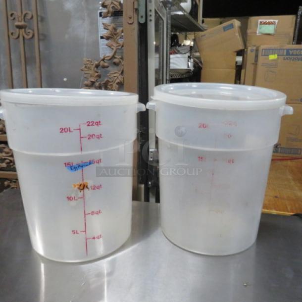 22 Quart Round Food Storage Container with lid, marked with measurements, clear plastic, durable and ideal for bulk storage.