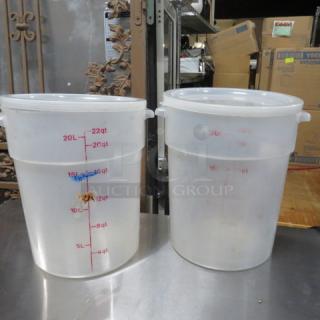 22 Quart Round Food Storage Container with lid, marked with measurements, clear plastic, durable and ideal for bulk storage.