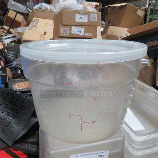 Cambro 12 qt round food storage container with lid, clear plastic, visible measurement markings, used condition.