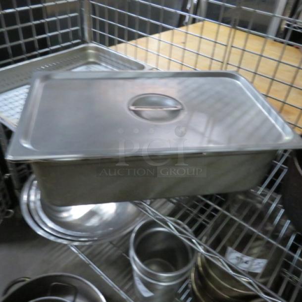 Full size 6-inch deep stainless steel hotel pan with lid, excellent condition, ideal for commercial kitchens.