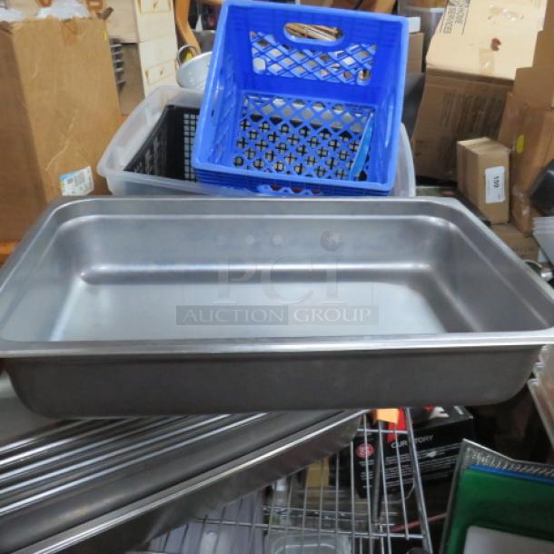 Full-size 4-inch deep hotel pan, metal, used but in good condition, ideal for catering or food service.