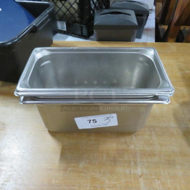1/3 size, 6-inch deep hotel pan in stainless steel, excellent condition. Item label reads "75, 3XBID."