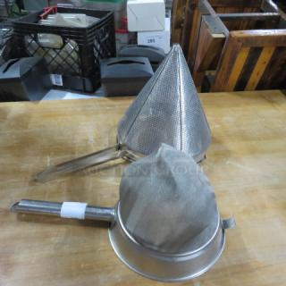 Assorted cone strainers, stainless steel, mesh design, good condition, ideal for culinary use, includes two strainers.