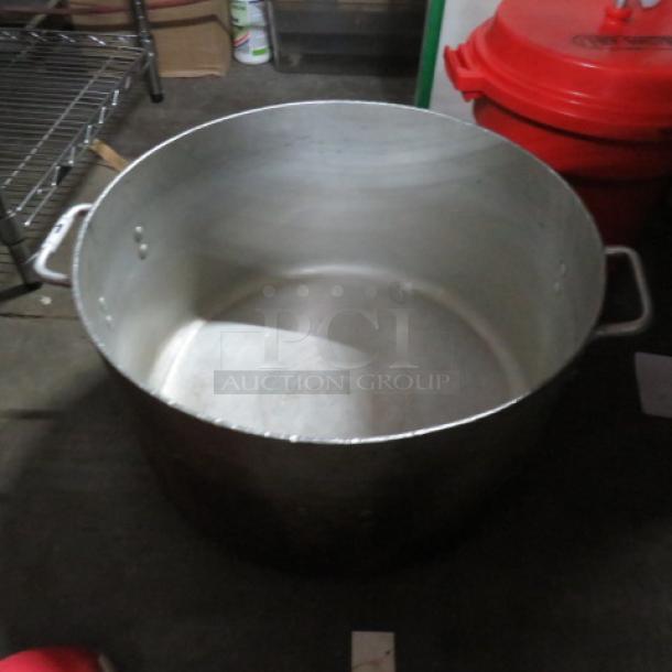 40-quart aluminum stock pot with side handles, used condition, showing light wear.