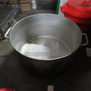 40-quart aluminum stock pot with side handles, used condition, showing light wear.