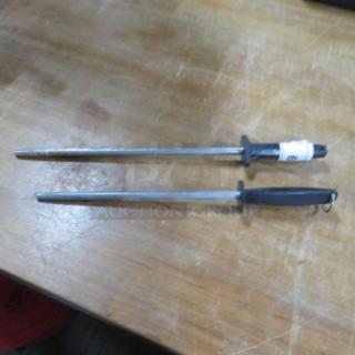 Knife Sharpener 2XBID set, featuring two metal sharpening rods with black handles. One rod includes a label with "2XBID." Slightly worn condition.