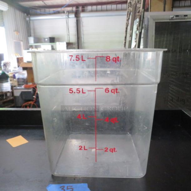 Clear 8 Quart Food Storage Container with red volume markings for liters and quarts. Used condition. No lid.