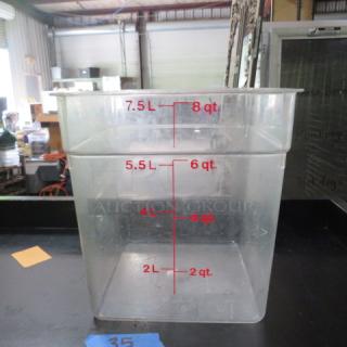 Clear 8 Quart Food Storage Container with red volume markings for liters and quarts. Used condition. No lid.