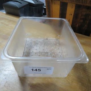 Perforated 1/2 size food storage container, 6-inch deep, transparent, with auction label "145" visible, in good condition.