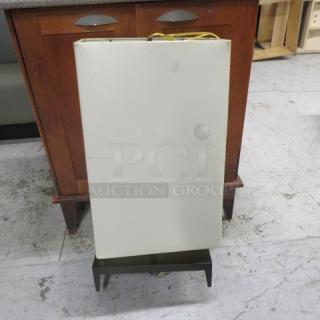 Brown metal lamp with one light and a beige rectangular shade. Sturdy construction, modern design. Good condition.