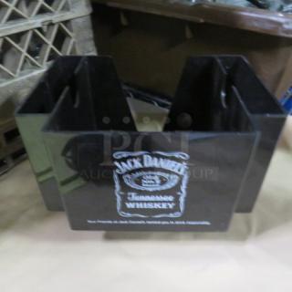 Black Jack Daniels bar organizer with logo, divided sections, used condition. Suitable for barware or cocktail accessories.