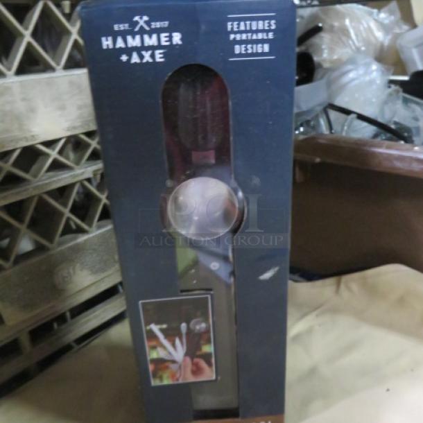 Hammer Axe 10-N-1 Bar Tool in original packaging, featuring a portable design; new condition.