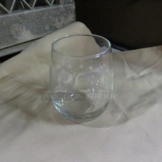 Clear stemless wine glass, gently curved design, smooth rim, excellent condition. Item code: 12XBID.