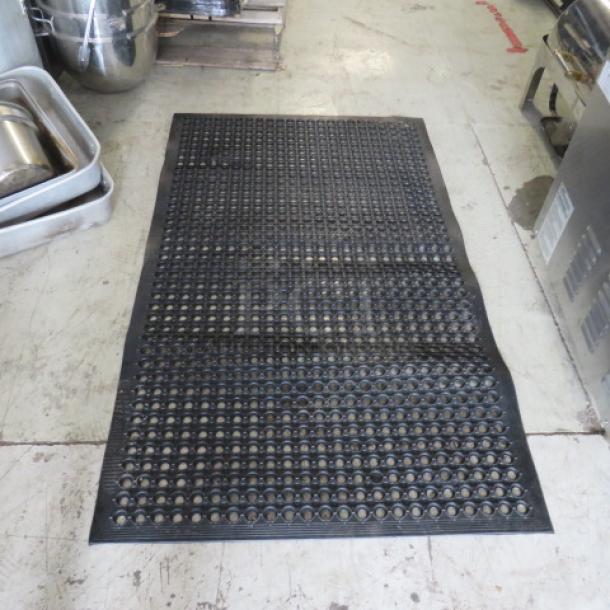 NEW fatigue mat, 59x35 inches, black with perforated surface, designed to reduce strain, ideal for prolonged standing.