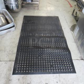NEW fatigue mat, 59x35 inches, black with perforated surface, designed to reduce strain, ideal for prolonged standing.