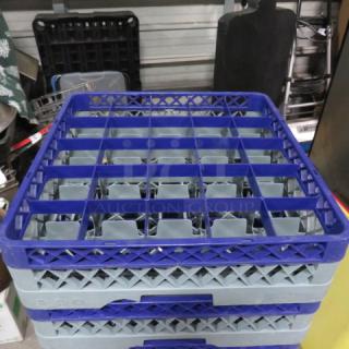 25 Hole Blue/Gray Dishwasher Rack, model 4XBID, in excellent condition. Features durable plastic grid design for secure dish placement.