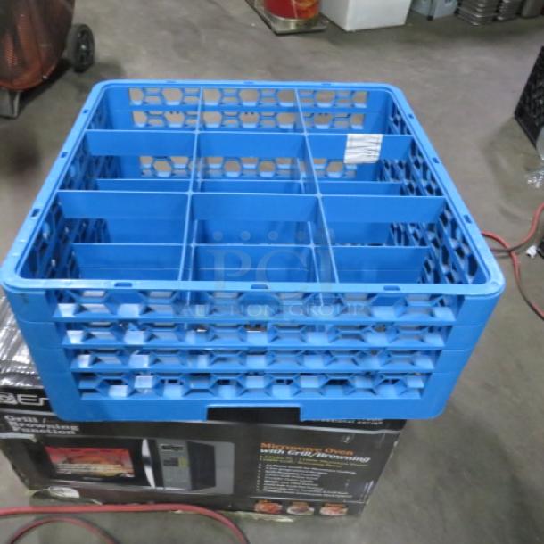 Blue deep dishwasher rack with 9 compartments. Sturdy plastic construction, in good condition, suitable for commercial use.