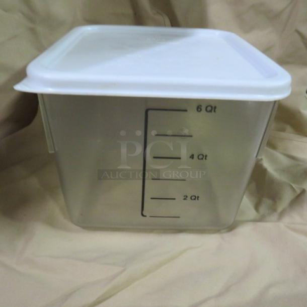 6-quart food storage container with lid, transparent plastic, marked in quarts, excellent condition.