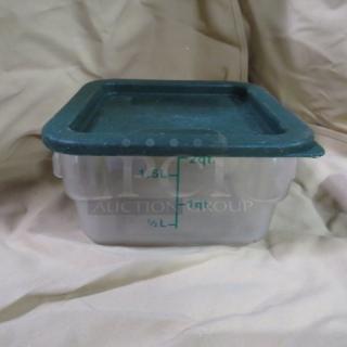Square 2-quart food storage container with green lid, clear plastic body, marked with volume measurements in quarts and liters.