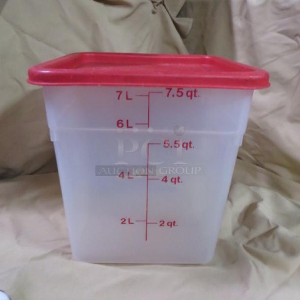 8 Quart food storage container with red lid, clear plastic with measurement markings in liters and quarts, used.