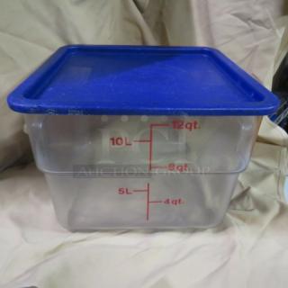 12 Quart food storage container with blue lid, clear sides with red measurement markings. Suitable for kitchen use.