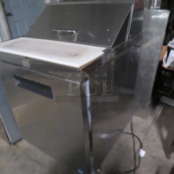 Hoshizaki 1-door refrigerated prep table with cutting board, model CRMR-27-8CC, 27"x30.5"x44", on casters, stainless steel.