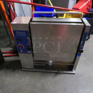 Prince Castle Bun Toaster, Model 296T65JACK, in used condition. 115 Volt, dimensions 25x8x26 inches.