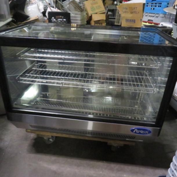 Atosa refrigerated countertop display cooler, 36x22x27 inches, with 2 racks. Stainless steel, clean condition, logo visible.