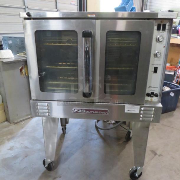 Southbend electric convection oven, model PDE75S/SD, with 5 racks, on caster stand. Stainless steel, excellent condition.