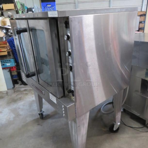 Southbend Electric Convection Oven PDE75S/SD on stand with casters, includes 5 racks. Excellent condition.