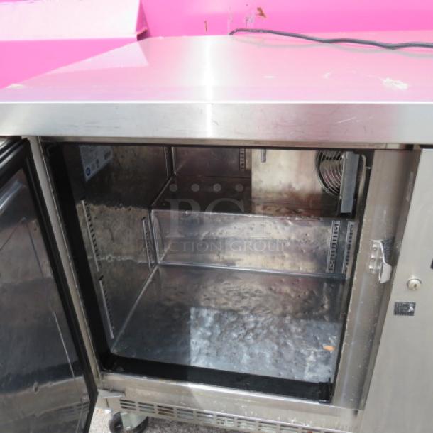 Everest 2 Door Work Top Refrigerator, Model ETBF2, on casters. Stainless steel, 48x31.5x30.5 inches, 115V.