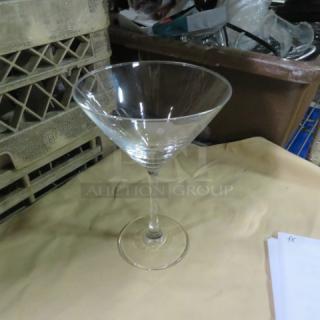 Clear martini glass, 9XBID model, pristine condition, sleek design, tapered bowl, resting on a slender stem.