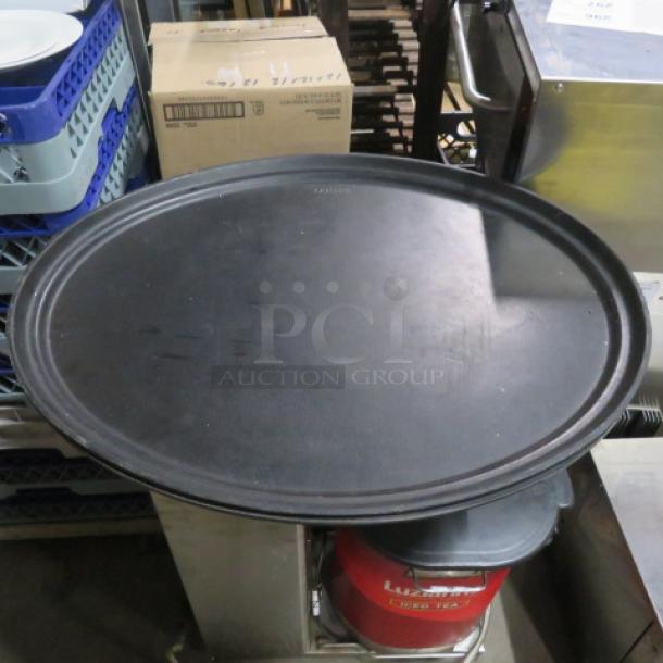 Black Cambro serving tray, size 27x22, in used condition with visible wear marks. Model 2XBID.
