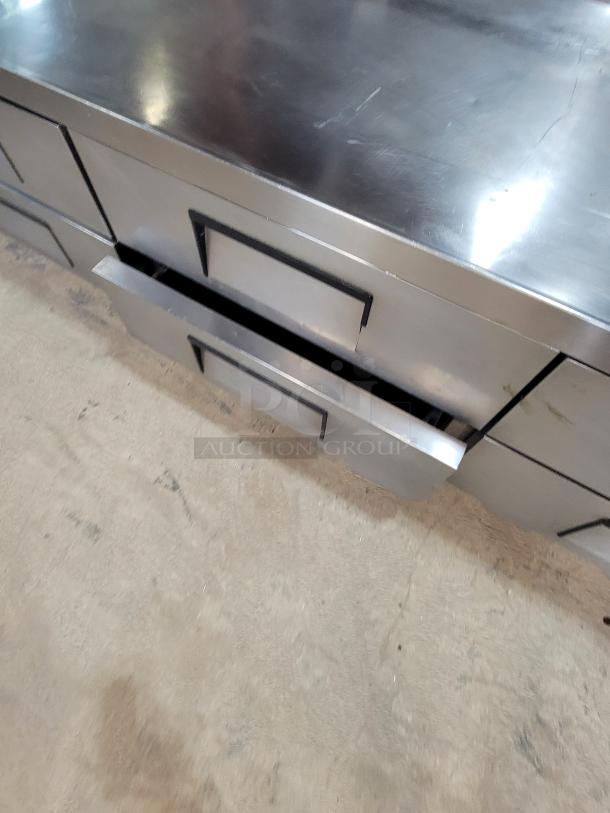 True TRCB-110 110" Chef Base with 6 drawers, stainless steel, commercial-grade, for restaurants. Appears in used condition.