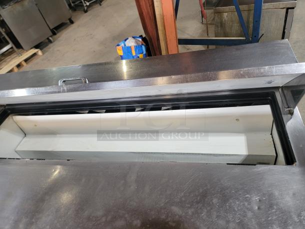 🔥 Boost Your Kitchen Efficiency! True 60" Salad/Sandwich Prep Table! Elevate your food prep game with this True TSSU-60-16-HC 60-inch Sandwich/Salad Prep Table with Refrigerated Base. This commercial-grade powerhouse is designed to streamline your operations and keep ingredients perfectly chilled. Tested and works! See video in description below 👇 - Image 2 of 5