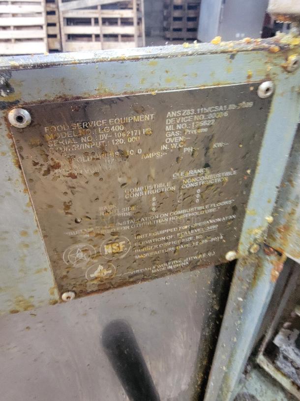 Superior LG400 gas 40lb fryer with visible identification plate, showing model and serial details. Used condition with signs of wear.
