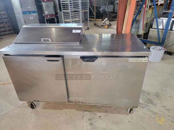 Beverage-Air SPE60HC-08: 60-inch Elite Series Refrigerated Prep Table! 60-inch, two-door refrigerated sandwich/salad prep table in excellent working and cosmetic condition. This is a robust and highly sought-after unit, perfect for restaurants, delis, cafes, or any food service operation needing efficient cold storage and prep space. Tested and working! - Image 1 of 5
