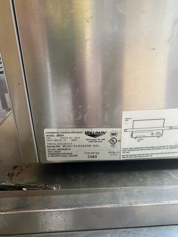 Vollrath JB3H Commercial Toaster/Finisher!  This stainless steel electric unit is perfect for quickly toasting bread, bagels, and buns, melting cheese on sandwiches, finishing casseroles, or warming various food items. Its compact countertop design makes it ideal for restaurants, cafes, delis, or concession stands with limited space. - Image 2 of 3