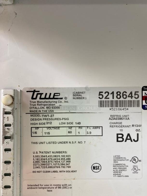 True TWT-27 Commercial Worktop Refrigerator label showing model, serial number 5218645, and specifications.