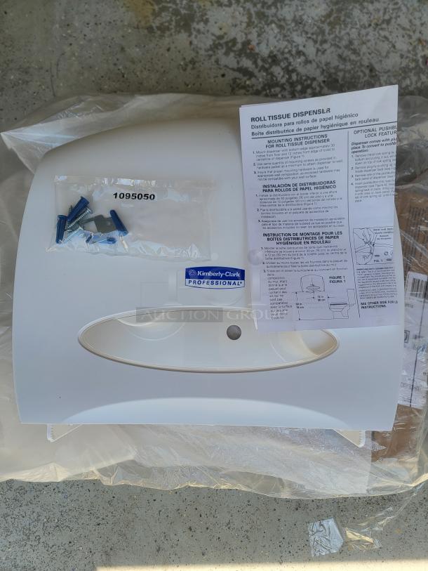 Brand new Kimberly-Clark 09508 Professional Toilet Tissue Dispenser, sealed in box with mounting instructions and hardware.
