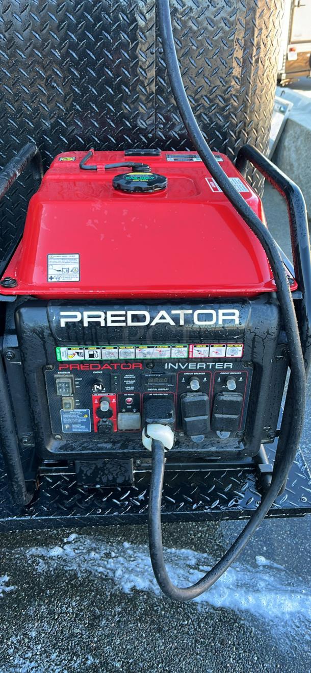 Predator 8750W inverter generator on a mobile kitchen trailer, featuring power outlets and control panel.
