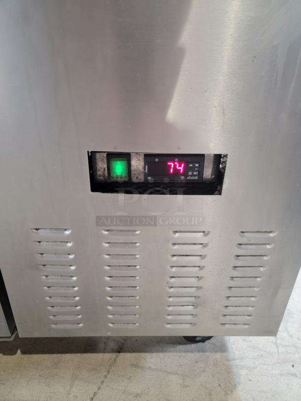 Central Exclusive 69K-014 stainless steel commercial pizza prep table, digital display showing 74°F, tested and functional.