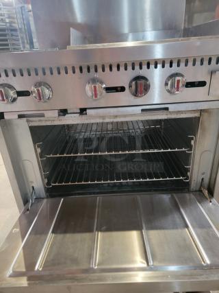 Kintera K2G24 commercial gas range featuring two burners, a 24" griddle, and a full-size oven. Robust and suitable for busy kitchens.